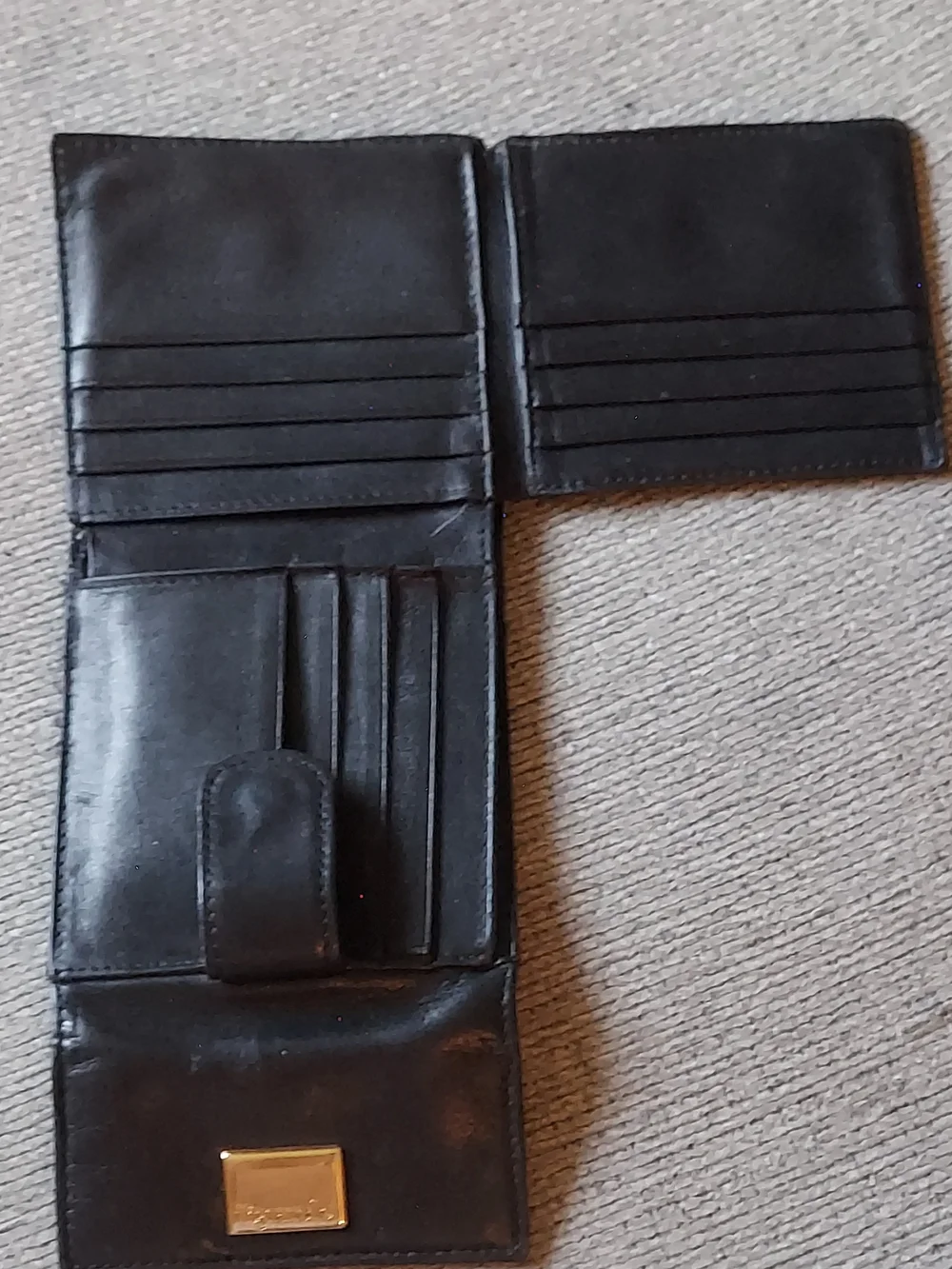 Tignanello Black Leather Bi-Fold Wallet with Gold Plaque